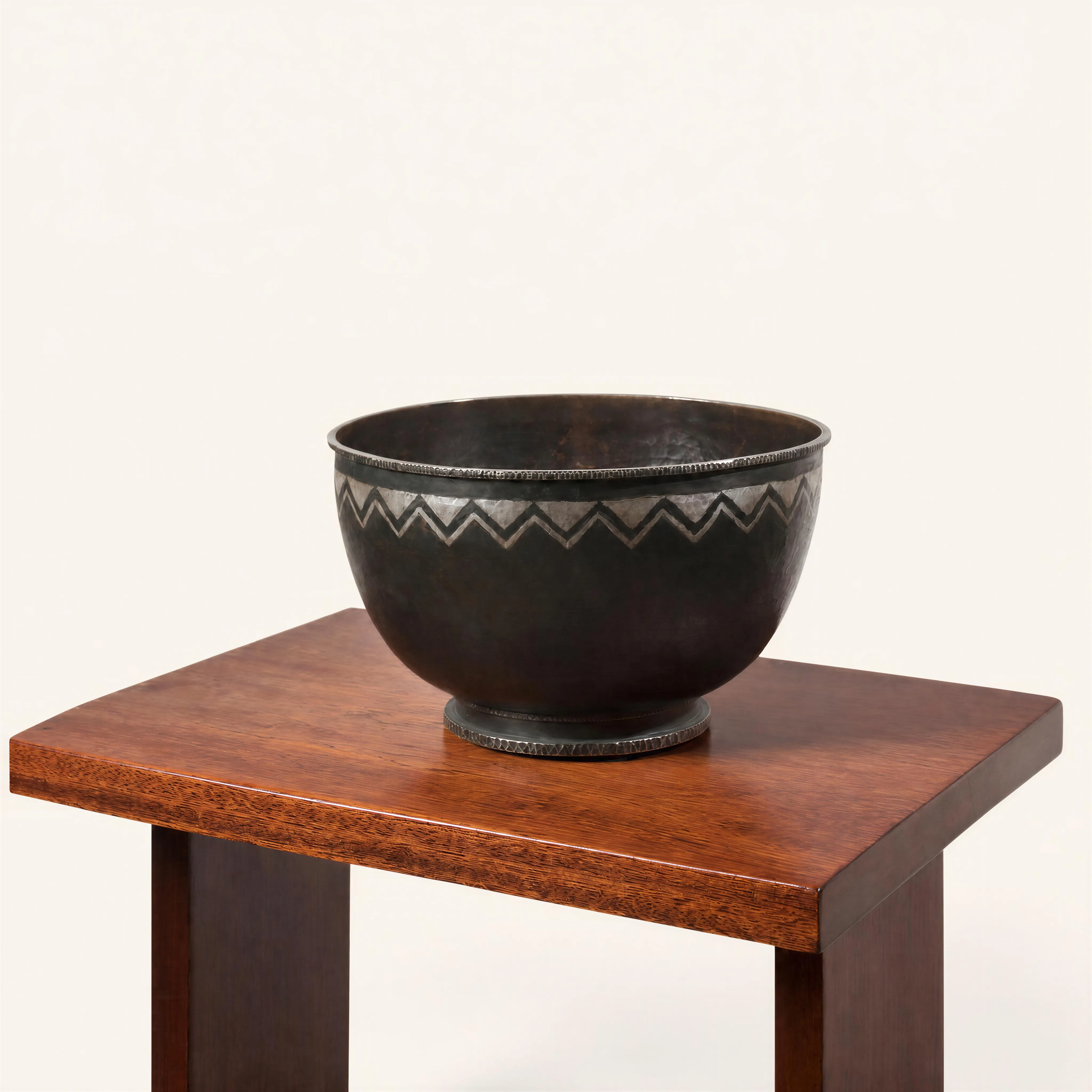 Dinanderie bowl with geometric chevron design