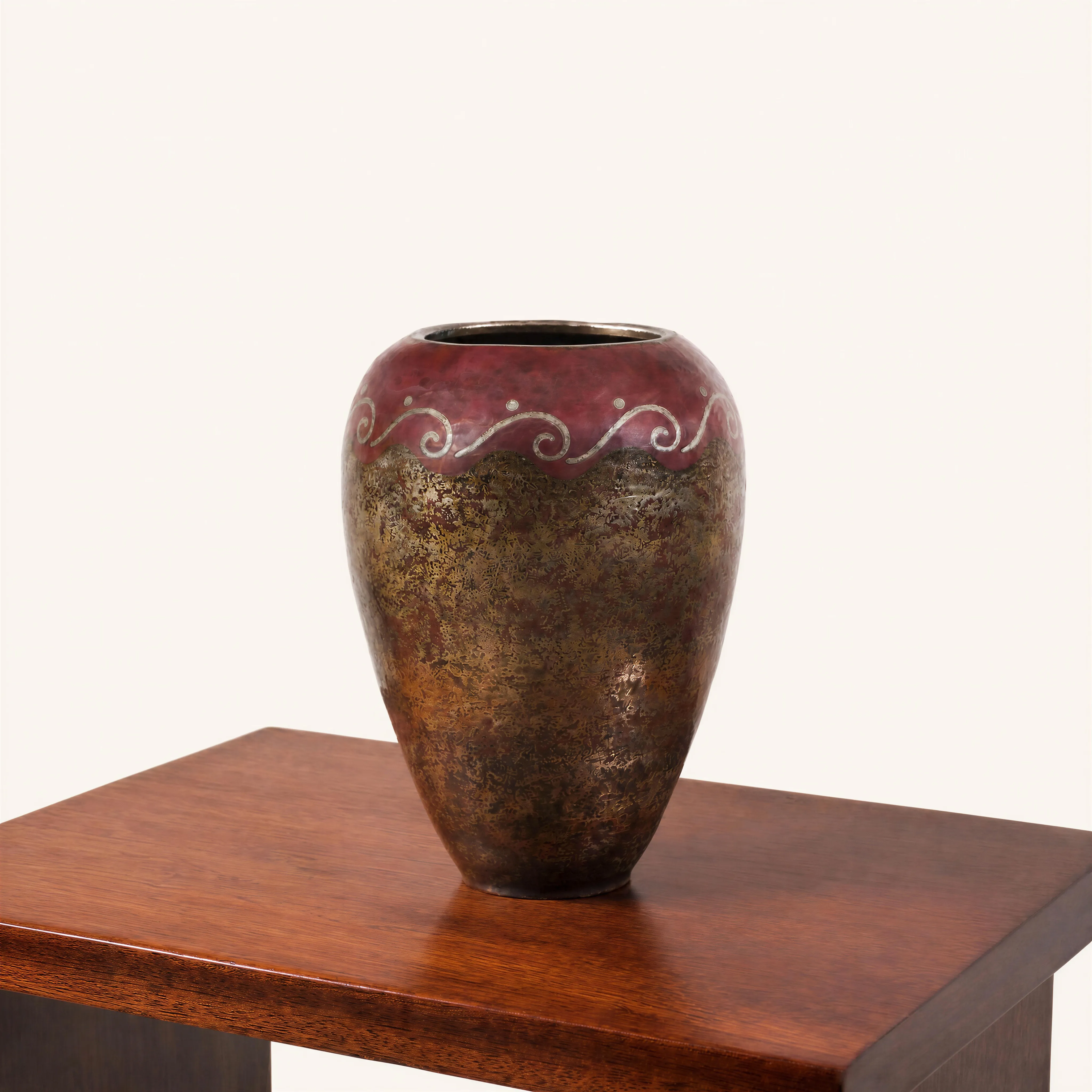 Dinanderie vase with undulating frieze decoration