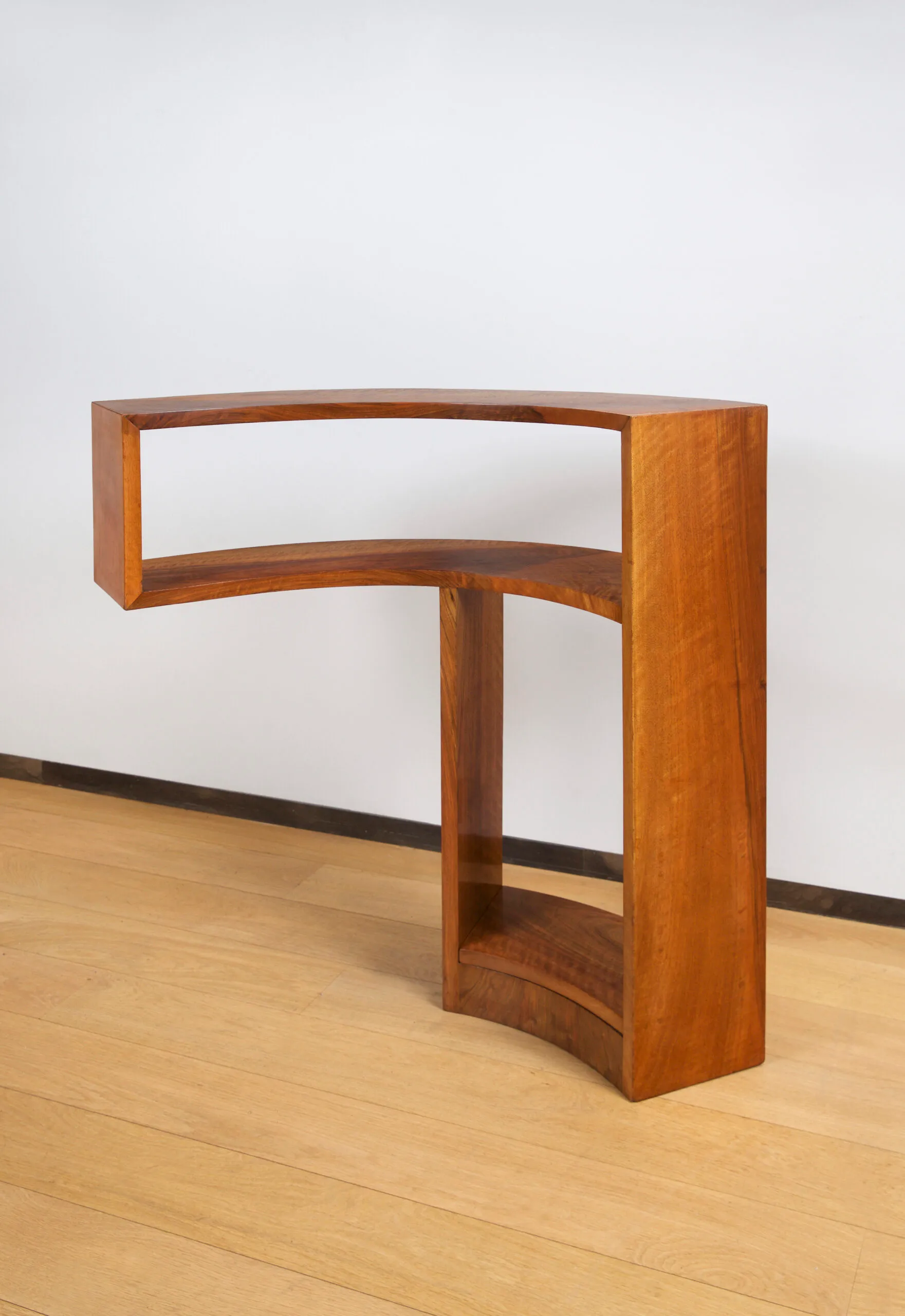 Detail view 1 – Small curved walnut bookcase.