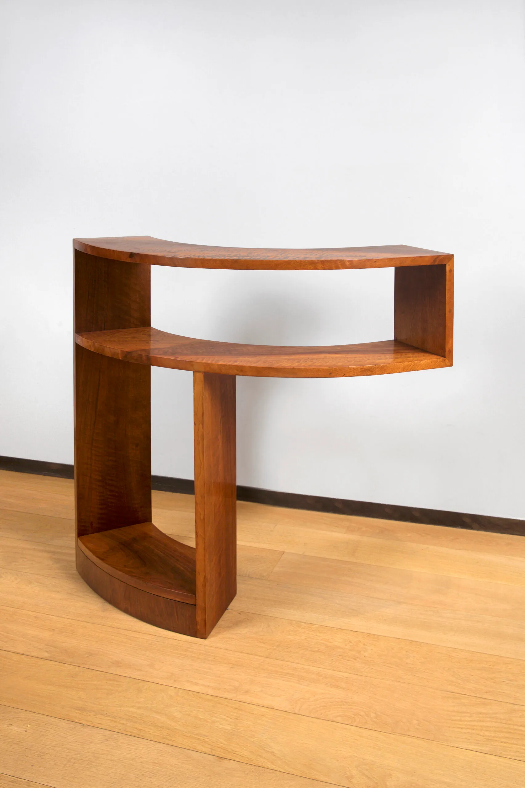 Detail view 2 – Small curved walnut bookcase.