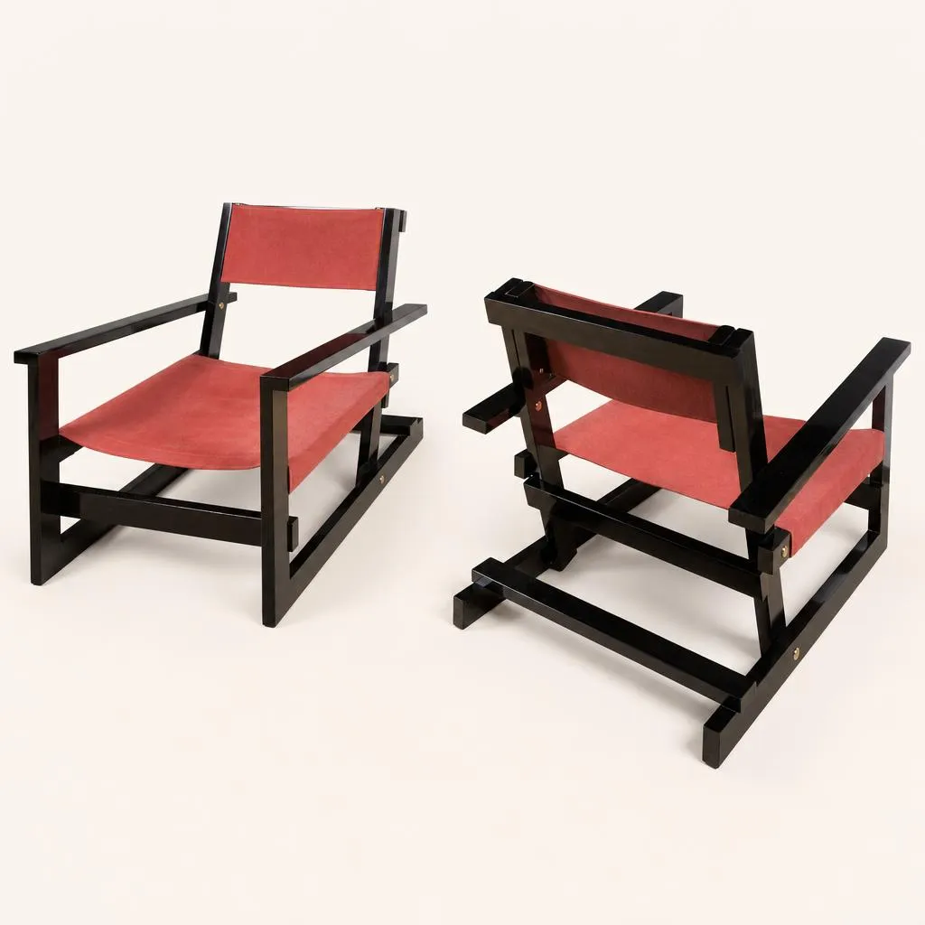Deux fauteuils en acajou et tissu