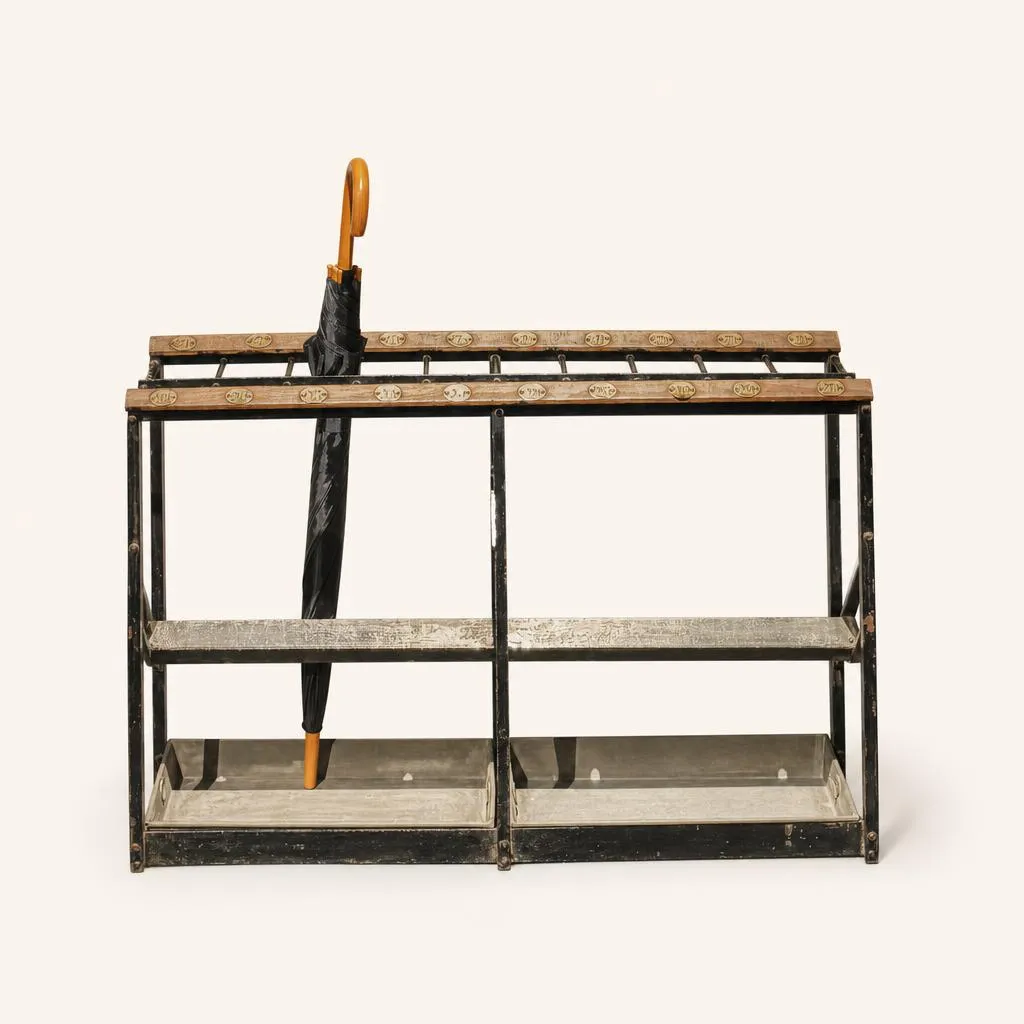 Two umbrella stands in iron (painted), brass, zinc and wood.